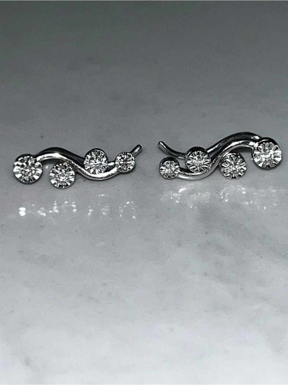 Diamond 10 Karat White Gold Wave Star Ear Climbers